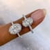 1.50 carat Oval Diamond Hidden Halo™ Engagement Ring on ladies finger