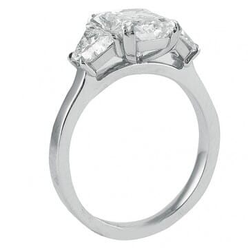 RADIANT CUT THREE STONE RING WITH TRAPEZOID SIDE DIAMONDS