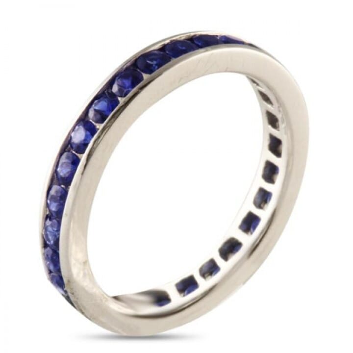 CHANNEL SET SAPPHIRE WHITE GOLD ETERNITY BAND