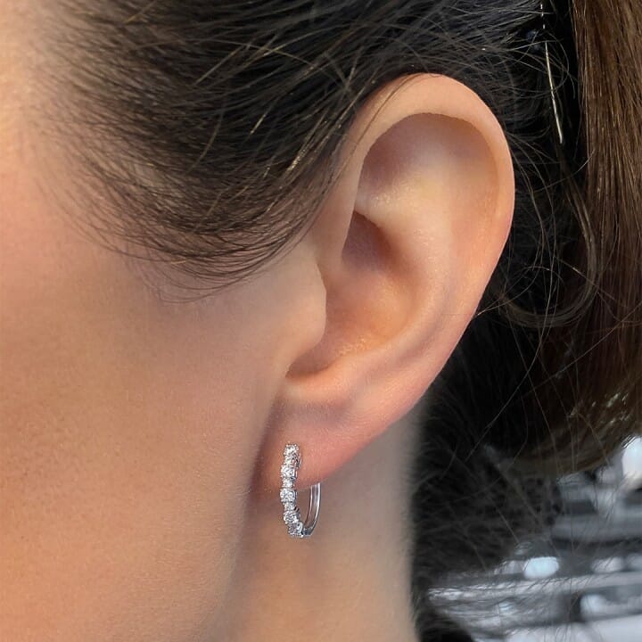 Alternating Size Diamond Huggie Earrings front