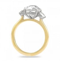three stone moissanite ring with antique cushion cut center