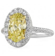 2.03 carat Oval Yellow Diamond Halo Engagement Ring front view