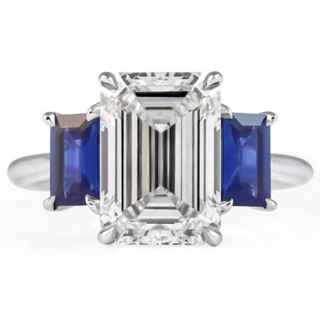 3.88 carat Emerald Cut Lab Diamond and Sapphire Three-Stone Ring flat