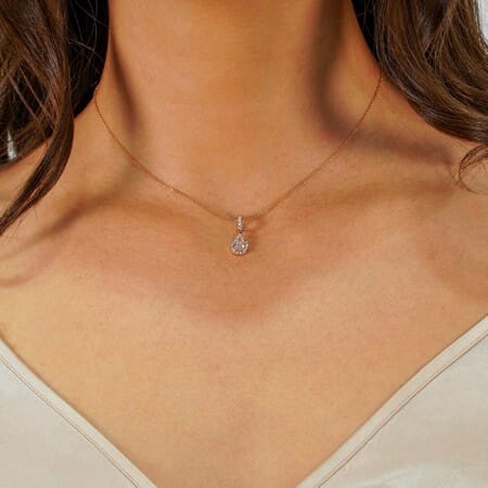 0.72 Carat Pear Shape Diamond in Halo Pendant Necklace