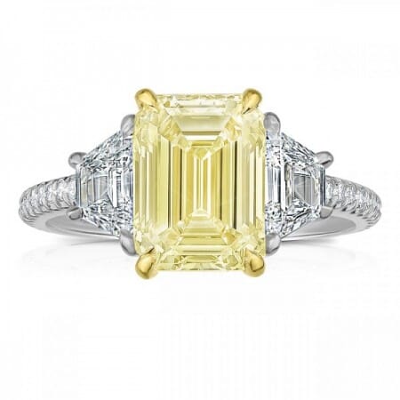 3.05 carat Yellow Diamond Emerald Cut Three-Stone Ring flat