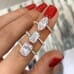 Radiant Cut Moissanite Swoop Engagement Ring finger