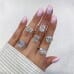 2.76 carat Oval Lab Diamond Bezel Set Pave Wrap Ring hand
