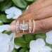 4.06 carat Emerald Cut Lab Diamond Signature Wrap Ring finger