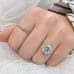 Cushion Cut Moissanite Three-Stone Engagement Ring on ladies hand