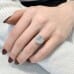 4.58 Carat Emerald Cut Lab Diamond Three-Stone Engagement Ring hand