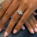 1.40 ct Oval Diamond Three-Stone Engagement Ring on ladies hand
