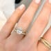 1.80 Carat Oval Diamond Two-Tone Solitaire Engagement Ring hand