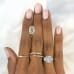 3.02ct Emerald Cut Diamond Three-Stone Engagement Ring hand
