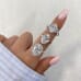 3.02 carat Oval Lab Diamond Seven-Stone Engagement Ring finger