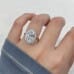 3.71 carat Oval Lab Diamond Halo Ring hand close up