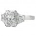 RADIANT CUT THREE STONE RING WITH TRAPEZOID SIDE DIAMONDS