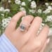 4.03 carat Emerald Cut Lab Diamond Lotus Signature Wrap Ring hand