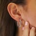 3.20 Carat Inside-Out Diamond Hoop Earrings on ladies ear