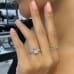 2.65 carat Cushion Cut Lab Diamond Pave Prong Engagement Ring hand