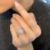 6.12 carat Oval Lab Diamond Signature Wrap Engagement Ring hand