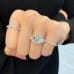 6.51 carat Asscher Cut Lab Diamond Three Stone Engagement Ring hand