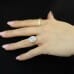 3.71 carat Oval Lab Diamond Halo Ring hand