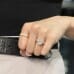 2.76 carat Oval Lab Diamond Bezel Set Pave Wrap Ring fist