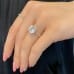 Cushion Cut Moissanite Two-Tone Bezel Wrap Engagement Ring hand