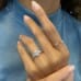 1.20ct Oval Diamond Invisible Gallery™ Three-Stone Ring hand pose