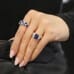 3.52 carat Sapphire Seven-Stone Engagement Ring hand