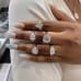 5.10 carat Emerald Cut Lab Diamond Three-Stone Engagement Ring stacked
