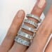 7.8 Carat Emerald Cut Diamond Shared Prong Eternity Band finger
