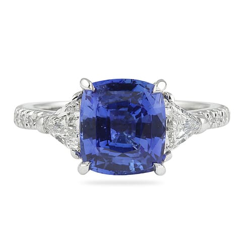 cushion cut diamond with sapphire side stones