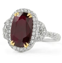 ruby and diamond three-stone halo ring